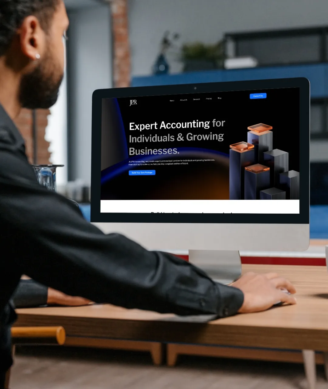 Professional website redesign mockup on desktop monitor